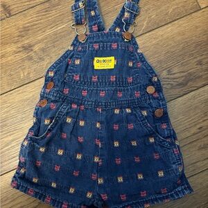 OshKosh B'gosh Navy Blue Denim Embroidered Short Overalls lions tigers yellow
